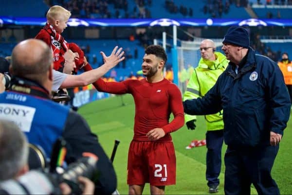 MANCHESTER, ENGLAND - Tuesday, April 10, 2018: Liverpool's Alex Oxlade-Chamberlain hands his shirt to a young supporter after the 2-1 (5-1 aggregate) victory over Manchester City during the UEFA Champions League Quarter-Final 2nd Leg match between Manchester City FC and Liverpool FC at the City of Manchester Stadium. (Pic by David Rawcliffe/Propaganda)