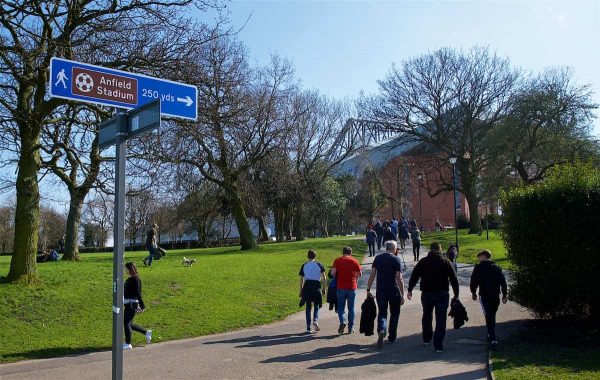 LIVERPOOL, ENGLAND - Saturday, April 14, 2018: Liverpool supporters make their way to the stadium from Stanley Park during the FA Premier League match between Liverpool FC and AFC Bournemouth at Anfield. (Pic by Laura Malkin/Propaganda)