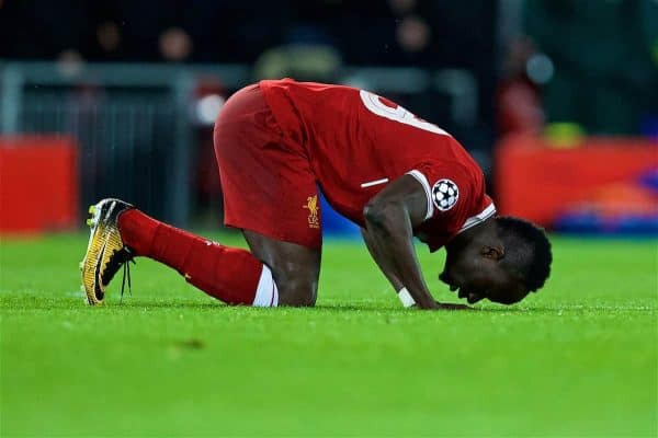 LIVERPOOL, ENGLAND - Tuesday, April 24, 2018: Liverpool's Sadio Mane kneels to pray as he celebrates scoring the third goal during the UEFA Champions League Semi-Final 1st Leg match between Liverpool FC and AS Roma at Anfield. (Pic by David Rawcliffe/Propaganda)