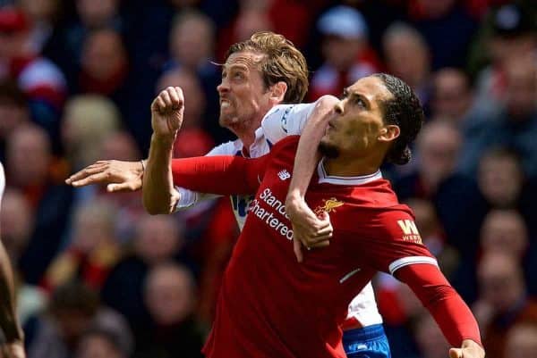 LIVERPOOL, ENGLAND - Saturday, April 28, 2018: Liverpool's Virgil van Dijk and Stoke City's Peter Crouch during the FA Premier League match between Liverpool FC and Stoke City FC at Anfield. (Pic by David Rawcliffe/Propaganda)