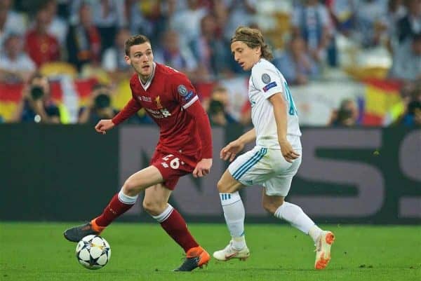 KIEV, UKRAINE - Saturday, May 26, 2018: Liverpool's Andy Robertson and Real Madrid's Luka Modri? during the UEFA Champions League Final match between Real Madrid CF and Liverpool FC at the NSC Olimpiyskiy. (Pic by Peter Powell/Propaganda)