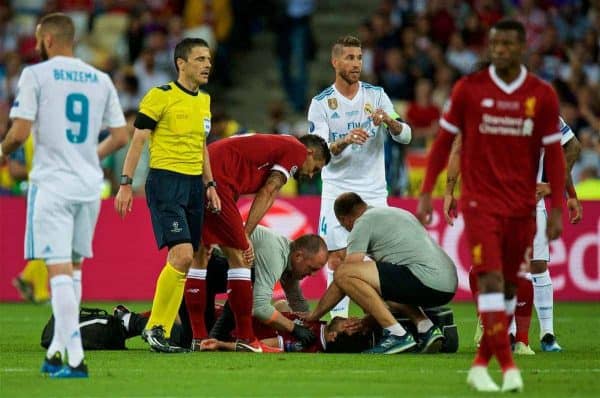 KIEV, UKRAINE - Saturday, May 26, 2018: Liverpool's Mohamed Salah is treated for an injury after being assaulted by Real Madrid's Sergio Ramos during the UEFA Champions League Final match between Real Madrid CF and Liverpool FC at the NSC Olimpiyskiy. (Pic by Peter Powell/Propaganda)