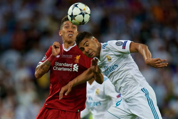 KIEV, UKRAINE - Saturday, May 26, 2018: Liverpool's Roberto Firmino and Real Madrid's Casemiro during the UEFA Champions League Final match between Real Madrid CF and Liverpool FC at the NSC Olimpiyskiy. (Pic by Peter Powell/Propaganda)