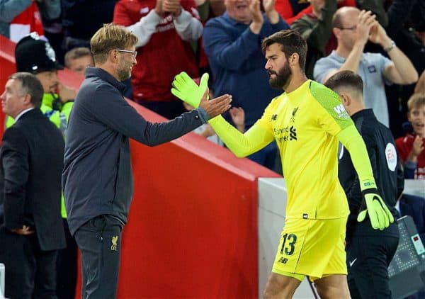 LIVERPOOL, ENGLAND - Tuesday, August 7, 2018: Liverpool's new signing goalkeeper Alisson Becker shakes hands with manager Jürgen Klopp as he is substituted during the preseason friendly match between Liverpool FC and Torino FC at Anfield. (Pic by David Rawcliffe/Propaganda)