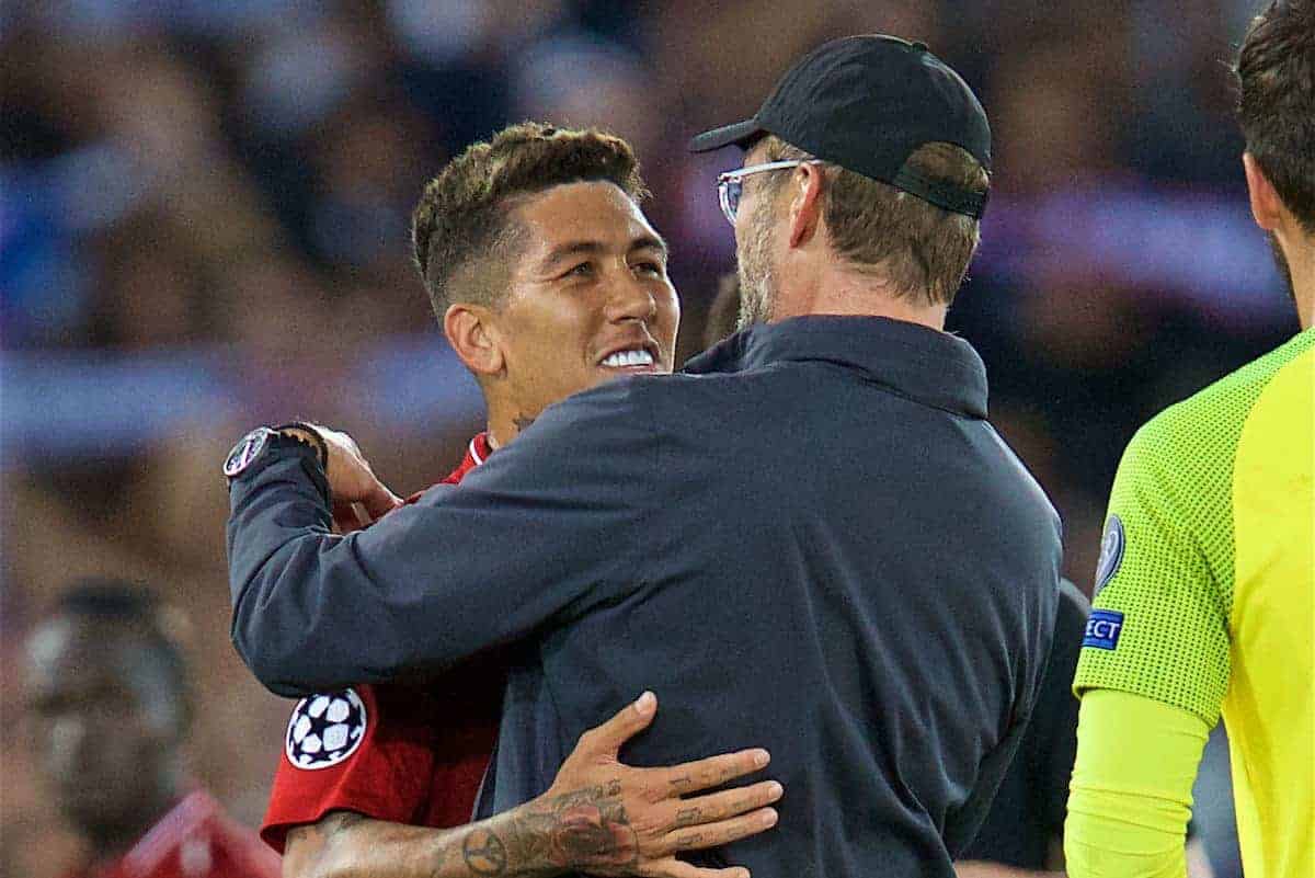 LIVERPOOL, ENGLAND - Tuesday, September 18, 2018: Liverpool's manager Jürgen Klopp (right) celebrates with Roberto Firmino after the UEFA Champions League Group C match between Liverpool FC and Paris Saint-Germain at Anfield. Liverpool won 3-2. (Pic by David Rawcliffe/Propaganda)