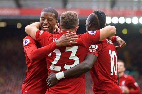 LIVERPOOL, ENGLAND - Saturday, September 22, 2018: Liverpool's Xherdan Shaqiri (#23) celebrates with team-mates Georginio Wijnaldum (left) and Sadio Mane (right) after creating the first goal, an own goal by Wesley Hoedt, during the FA Premier League match between Liverpool FC and Southampton FC at Anfield. (Pic by Jon Super/Propaganda)