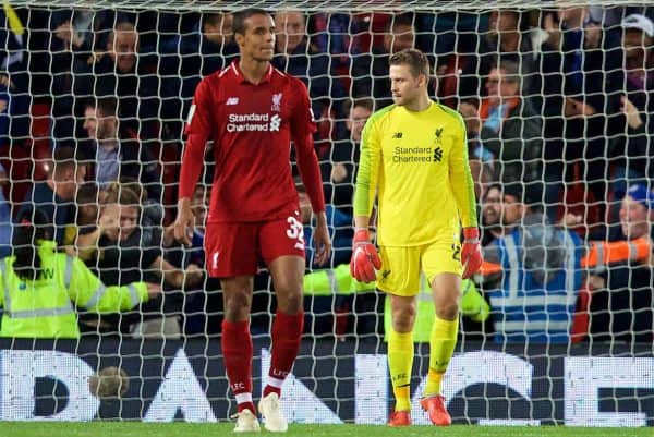 LIVERPOOL, ENGLAND - Wednesday, September 26, 2018: Liverpool's Joel Matip and goalkeeper Simon Mignolet look dejected during the Football League Cup 3rd Round match between Liverpool FC and Chelsea FC at Anfield. (Pic by David Rawcliffe/Propaganda)