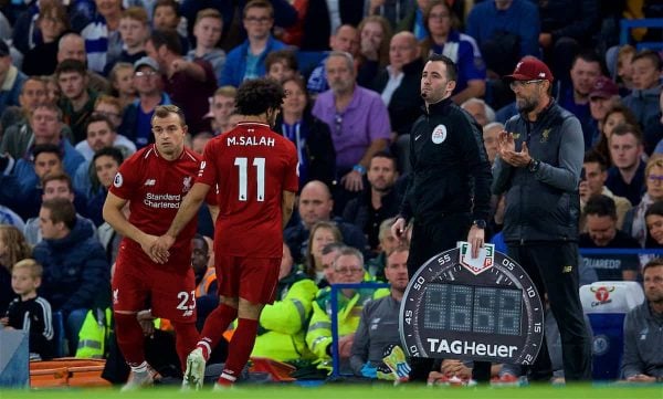 LONDON, ENGLAND - Saturday, September 29, 2018: Liverpool's Mohamed Salah is replaced by substitute Xherdan Shaqiri by manager JÃ¼rgen Klopp during the FA Premier League match between Chelsea FC and Liverpool FC at Stamford Bridge. (Pic by David Rawcliffe/Propaganda)