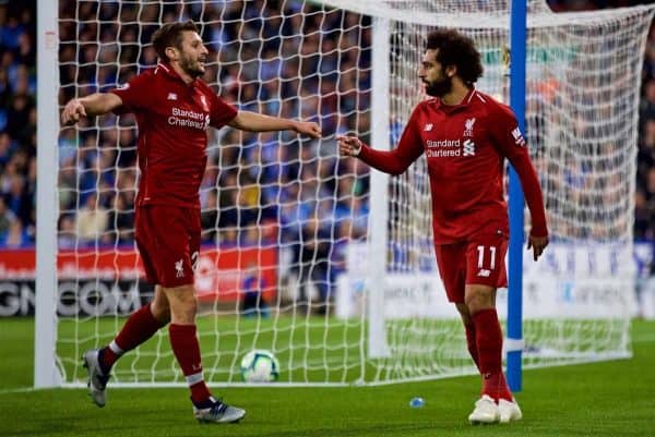 HUDDERSFIELD, ENGLAND - Saturday, October 20, 2018: Liverpool's Mohamed Salah celebrates scoring the first goal with team-mate Adam Lallana during the FA Premier League match between Huddersfield Town FC and Liverpool FC at Kirklees Stadium. (Pic by David Rawcliffe/Propaganda)