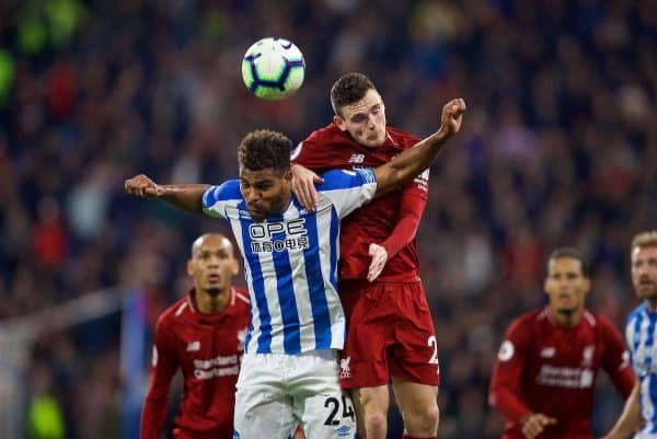 HUDDERSFIELD, ENGLAND - Saturday, October 20, 2018: Liverpool's Andy Robertson (right) and Huddersfield Town's Steve Mounié during the FA Premier League match between Huddersfield Town FC and Liverpool FC at Kirklees Stadium. (Pic by David Rawcliffe/Propaganda)