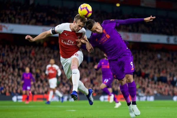 LONDON, ENGLAND - Saturday, November 3, 2018:Arsenal's Rob Holding (L) and Liverpool's Roberto Firmino (R) during the FA Premier League match between Arsenal FC and Liverpool FC at Emirates Stadium. (Pic by David Rawcliffe/Propaganda)