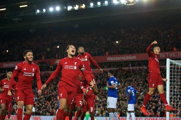 LIVERPOOL, ENGLAND - Sunday, December 2, 2018: Liverpool's Joe Gomez, Virgil van Dijk, Georginio Wijnaldum and Fabio Henrique Tavares 'Fabinho' celebrate an injury time winning goal from Divock Origi (hidden) during the FA Premier League match between Liverpool FC and Everton FC at Anfield, the 232nd Merseyside Derby. Liverpool won 1-0. (Pic by Paul Greenwood/Propaganda)