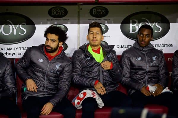 BURNLEY, ENGLAND - Wednesday, December 5, 2018: Liverpool's substitutes Mohamed Salah (L) and Roberto Firmino on the bench before the FA Premier League match between Burnley FC and Liverpool FC at Turf Moor. (Pic by David Rawcliffe/Propaganda)