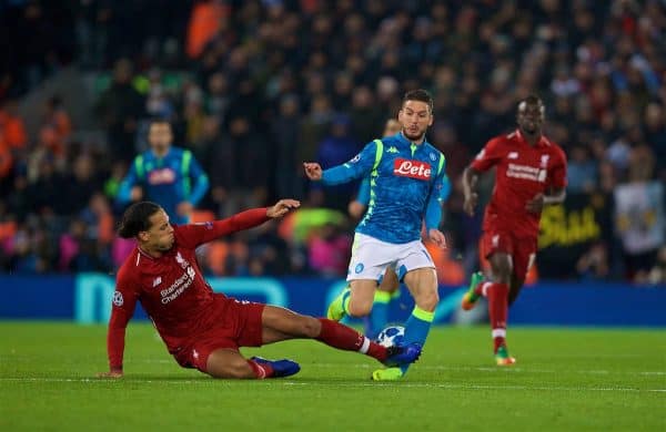 LIVERPOOL, ENGLAND - Tuesday, December 11, 2018: Liverpool's Virgil van Dijk tackles Napoli's Dries Mertens, and receives a yellow card, during the UEFA Champions League Group C match between Liverpool FC and SSC Napoli at Anfield. (Pic by David Rawcliffe/Propaganda)