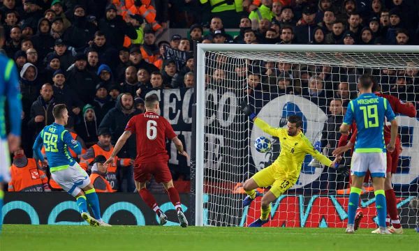 LIVERPOOL, ENGLAND - Tuesday, December 11, 2018: Liverpool's goalkeeper Alisson Becker makes an injury time save from Napoli's Arkadiusz Milik during the UEFA Champions League Group C match between Liverpool FC and SSC Napoli at Anfield. (Pic by David Rawcliffe/Propaganda)