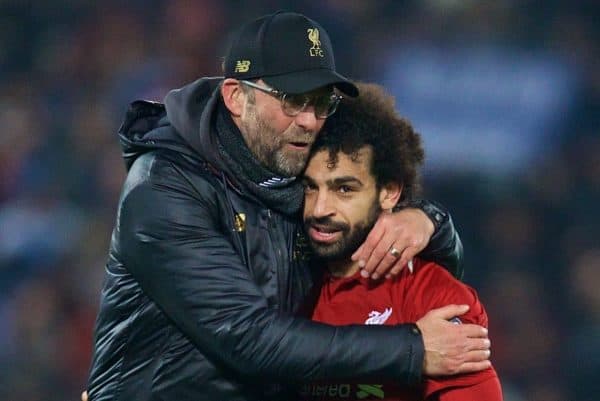 LIVERPOOL, ENGLAND - Tuesday, December 11, 2018: Liverpool manager Jürgen Klopp celebrates with striker Mohamed Salah after beating SSC Napoli 1-0 and going through the jump-off phase in the Group C match of the day. UEFA Champions League between Liverpool FC and SSC Napoli at Anfield. (Photo by David Rawcliffe / Propaganda)