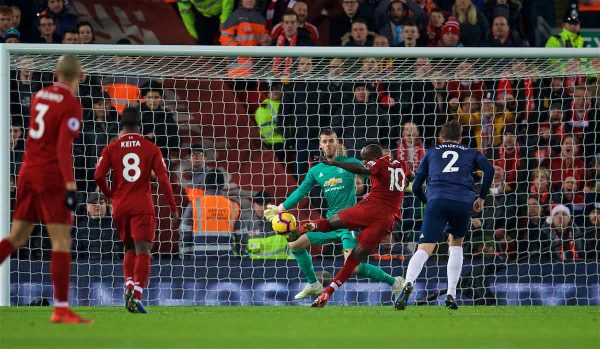 LIVERPOOL, ENGLAND - Sunday, December 16, 2018: Liverpool's Sadio Mane scores the first goal past Manchester United's goalkeeper David de Gea during the FA Premier League match between Liverpool FC and Manchester United FC at Anfield. (Pic by David Rawcliffe/Propaganda)