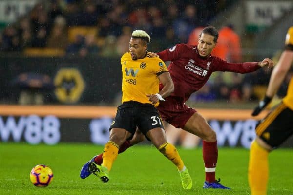 WOLVERHAMPTON, ENGLAND - Friday, December 21, 2018: Wolverhampton Wanderers's Adama Traoré (L) and Liverpool's Virgil van Dijk during the FA Premier League match between Wolverhampton Wanderers FC and Liverpool FC at Molineux Stadium. (Pic by David Rawcliffe/Propaganda)