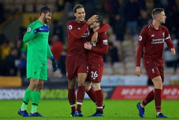 WOLVERHAMPTON, ENGLAND - Friday, December 21, 2018: Liverpool's goal-scorer Virgil van Dijk celebrates with team-mates Andy Robertson after beating Wolverhampton Wanderers 2-0 during the FA Premier League match between Wolverhampton Wanderers FC and Liverpool FC at Molineux Stadium. (Pic by David Rawcliffe/Propaganda)