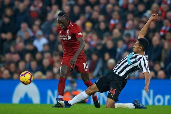 LIVERPOOL, ENGLAND - Boxing Day, Wednesday, December 26, 2018: Liverpool's Sadio Mane is tackled by Newcastle United's Isaac Hayden during the FA Premier League match between Liverpool FC and Newcastle United FC at Anfield. (Pic by David Rawcliffe/Propaganda)