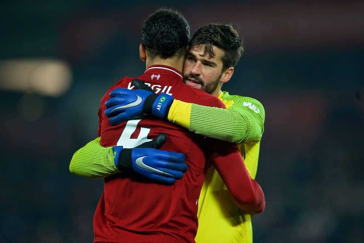 LIVERPOOL, ENGLAND - Boxing Day, Wednesday, December 26, 2018: Liverpool's goalkeeper Alisson Becker celebrates with Virgil van Dijk after beating Newcastle United 4-0 during the FA Premier League match between Liverpool FC and Newcastle United FC at Anfield. (Pic by David Rawcliffe/Propaganda)