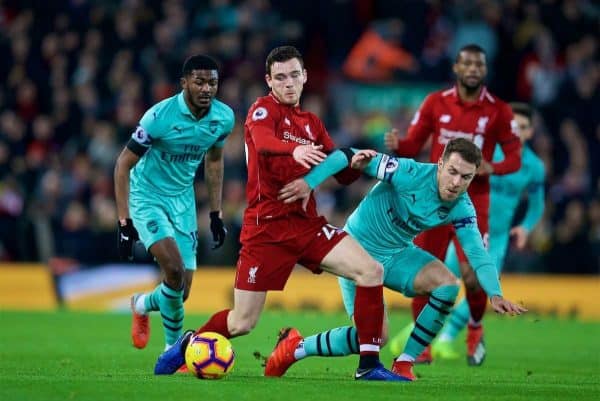 LIVERPOOL, ENGLAND - Saturday, December 29, 2018: Liverpool's Andy Robertson (C), Arsenal's Ainsley Maitland-Niles (L) and Aaron Ramsey (R) during the FA Premier League match between Liverpool FC and Arsenal FC at Anfield. (Pic by David Rawcliffe/Propaganda)