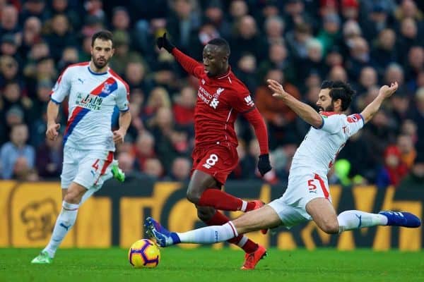 LIVERPOOL, ENGLAND - Saturday, January 19, 2019: Liverpool's Naby Keita (C) is tackled by Crystal Palace's James Tomkins (R) during the FA Premier League match between Liverpool FC and Crystal Palace FC at Anfield. (Pic by David Rawcliffe/Propaganda)