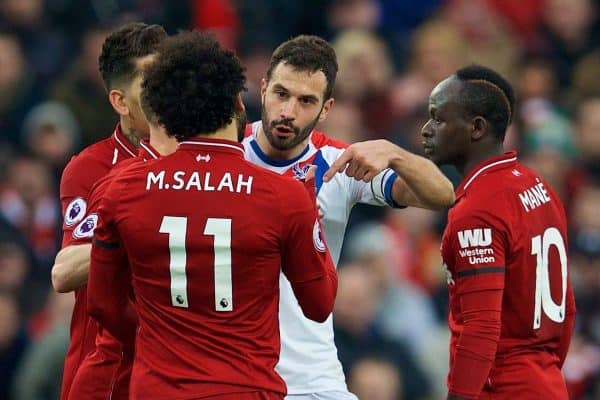 LIVERPOOL, ENGLAND - Saturday, January 19, 2019: Crystal Palace's captain Luka Milivojevi? clashes with Liverpool's Mohamed Salah during the FA Premier League match between Liverpool FC and Crystal Palace FC at Anfield. (Pic by David Rawcliffe/Propaganda)