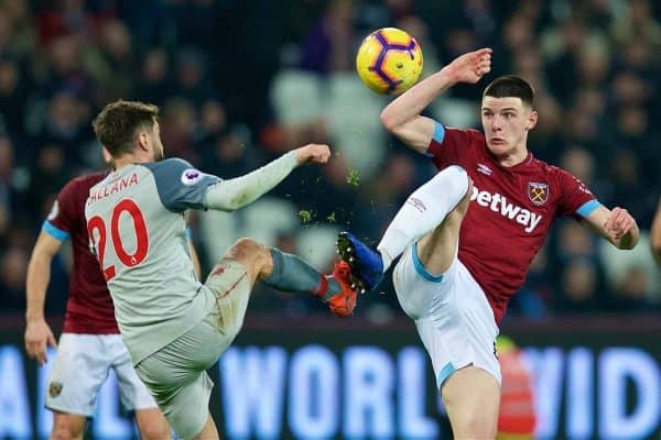 LONDON, ENGLAND - Monday, February 4, 2019: Liverpool's Adam Lallana (L) and West Ham United's Declan Rice during the FA Premier League match between West Ham United FC and Liverpool FC at the London Stadium. (Pic by David Rawcliffe/Propaganda)