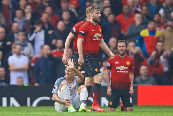 MANCHESTER, ENGLAND - Sunday, February 24, 2019: Liverpool's Roberto Firmino is injured during the FA Premier League match between Manchester United FC and Liverpool FC at Old Trafford. (Pic by David Rawcliffe/Propaganda)