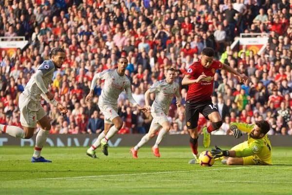 MANCHESTER, ENGLAND - Sunday, February 24, 2019: Liverpool's goalkeeper Alisson Becker makes a save from Manchester United's Jesse Lingard during the FA Premier League match between Manchester United FC and Liverpool FC at Old Trafford. (Pic by David Rawcliffe/Propaganda)