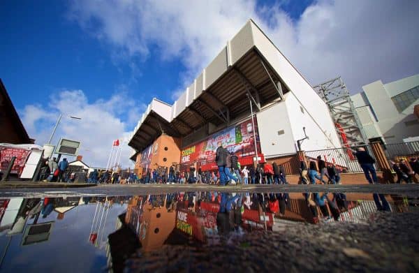 LIVERPOOL, ENGLAND - Saturday, March 9, 2019: An exterior view of Liverpool's Spion Kop stand with supporters reflected in a puddle ahead the FA Premier League match between Liverpool FC and Burnley FC at Anfield. (Pic by David Rawcliffe/Propaganda)