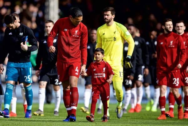 LONDON, ENGLAND - Sunday, March 17, 2019: Liverpool's Virgil van Dijk chats with his mascot before the FA Premier League match between Fulham FC and Liverpool FC at Craven Cottage. (Pic by David Rawcliffe/Propaganda)