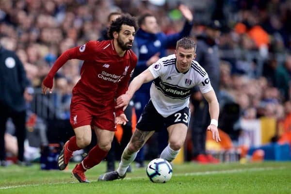 LONDON, ENGLAND - Sunday, March 17, 2019: Liverpool's Mohamed Salah (L) and Fulham's Joe Bryan during the FA Premier League match between Fulham FC and Liverpool FC at Craven Cottage. (Pic by David Rawcliffe/Propaganda)