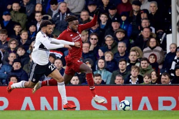 LONDON, ENGLAND - Sunday, March 17, 2019: Fulham's Cyrus Christie (L) and Liverpool's Divock Origi during the FA Premier League match between Fulham FC and Liverpool FC at Craven Cottage. (Pic by David Rawcliffe/Propaganda)