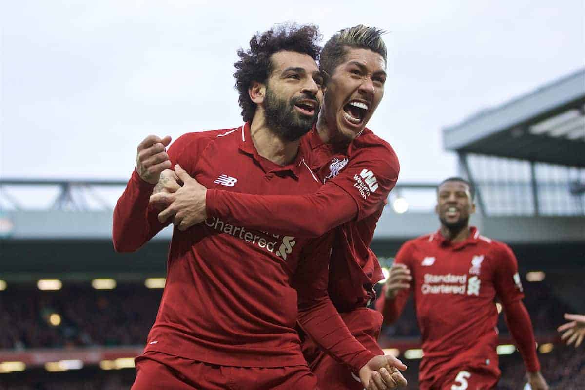 LIVERPOOL, ENGLAND - Sunday, March 31, 2019: Liverpool's Mohamed Salah celebrates after his header forced a winning goal, an own goal from Tottenham Hotspur's Toby Alderweireld with team-mate Roberto Firmino during the FA Premier League match between Liverpool FC and Tottenham Hotspur FC at Anfield. (Pic by David Rawcliffe/Propaganda)