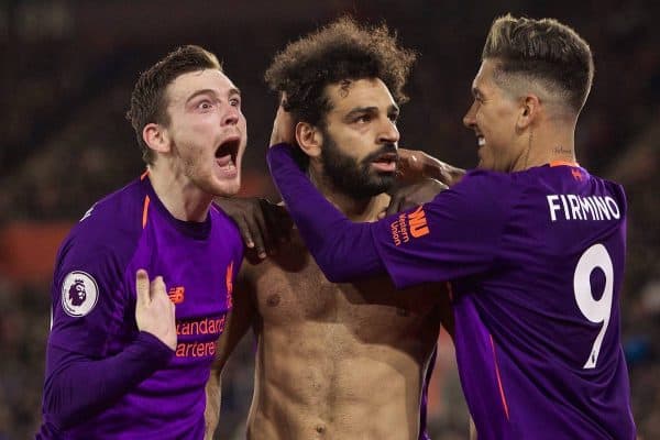 SOUTHAMPTON, ENGLAND - Friday, April 5, 2019: Liverpool's Mohamed Salah (C) celebrates scoring the second goal with team-mates Andy Robertson (L) and Roberto Firmino (R) during the FA Premier League match between Southampton FC and Liverpool FC at the St. Mary's Stadium. (Pic by David Rawcliffe/Propaganda)