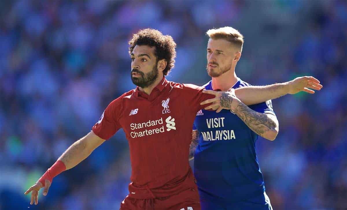 CARDIFF, WALES - Saturday, April 20, 2019: Liverpool's Mohamed Salah (L) and Cardiff City's Joe Bennett during the FA Premier League match between Cardiff City FC and Liverpool FC at the Cardiff City Stadium. (Pic by David Rawcliffe/Propaganda)