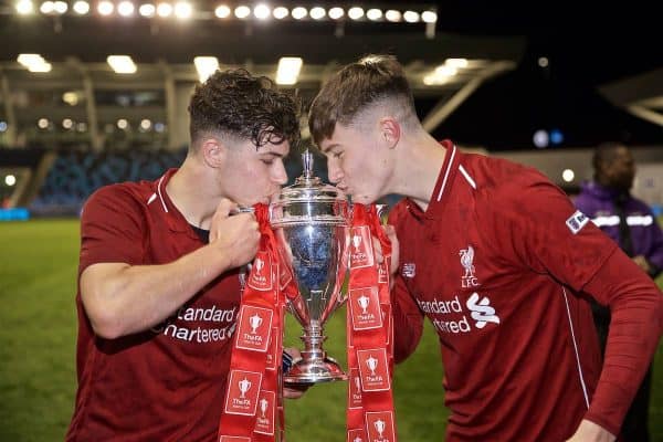 MANCHESTER, ENGLAND - Thursday, April 25, 2019: Liverpool's Welsh duo Neco Williams (L) and Morgan Boyes (R) celebrate with the trophy after the FA Youth Cup Final match between Manchester City FC and Liverpool FC at the Academy Stadium. Liverpool won 5-4 on penalties after a 1-1 extra-time draw. (Pic by David Rawcliffe/Propaganda)