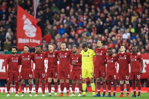 LIVERPOOL, ENGLAND - Friday, April 26, 2019: Liverpool players stand for a minute's silence to remember the late Tommy Smith, the club's first European Cup winning captain, before during the FA Premier League match between Liverpool FC and Huddersfield Town AFC at Anfield. (Pic by David Rawcliffe/Propaganda)