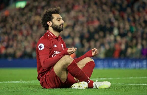 LIVERPOOL, ENGLAND - Friday, April 26, 2019: Liverpool's Mohamed Salah celebrates scoring the fifth goal with a yoga zen pose during the FA Premier League match between Liverpool FC and Huddersfield Town AFC at Anfield. (Pic by David Rawcliffe/Propaganda)