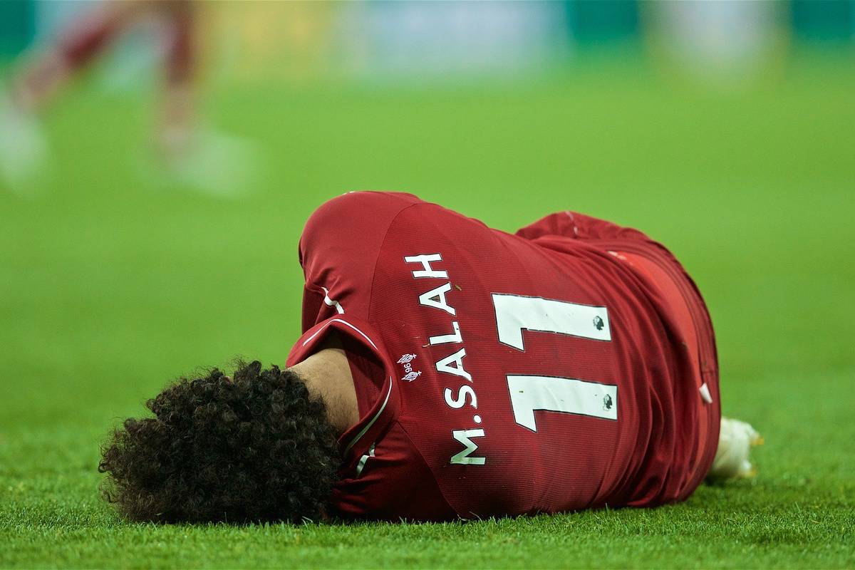 NEWCASTLE-UPON-TYNE, ENGLAND - Saturday, May 4, 2019: Liverpool's Mohamed Salah lies down injured during the FA Premier League match between Newcastle United FC and Liverpool FC at St. James' Park. (Pic by David Rawcliffe/Propaganda)