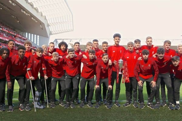 LIVERPOOL, ENGLAND - Sunday, May 12, 2019: Liverpool’s victorious FA Youth Cup winning squad pose for a team photograph with Rhys Taylor (L) and captain Paul Glatzel (R) holding the trophy during the final FA Premier League match of the season between Liverpool FC and Wolverhampton Wanderers FC at Anfield. (Pic by David Rawcliffe/Propaganda)