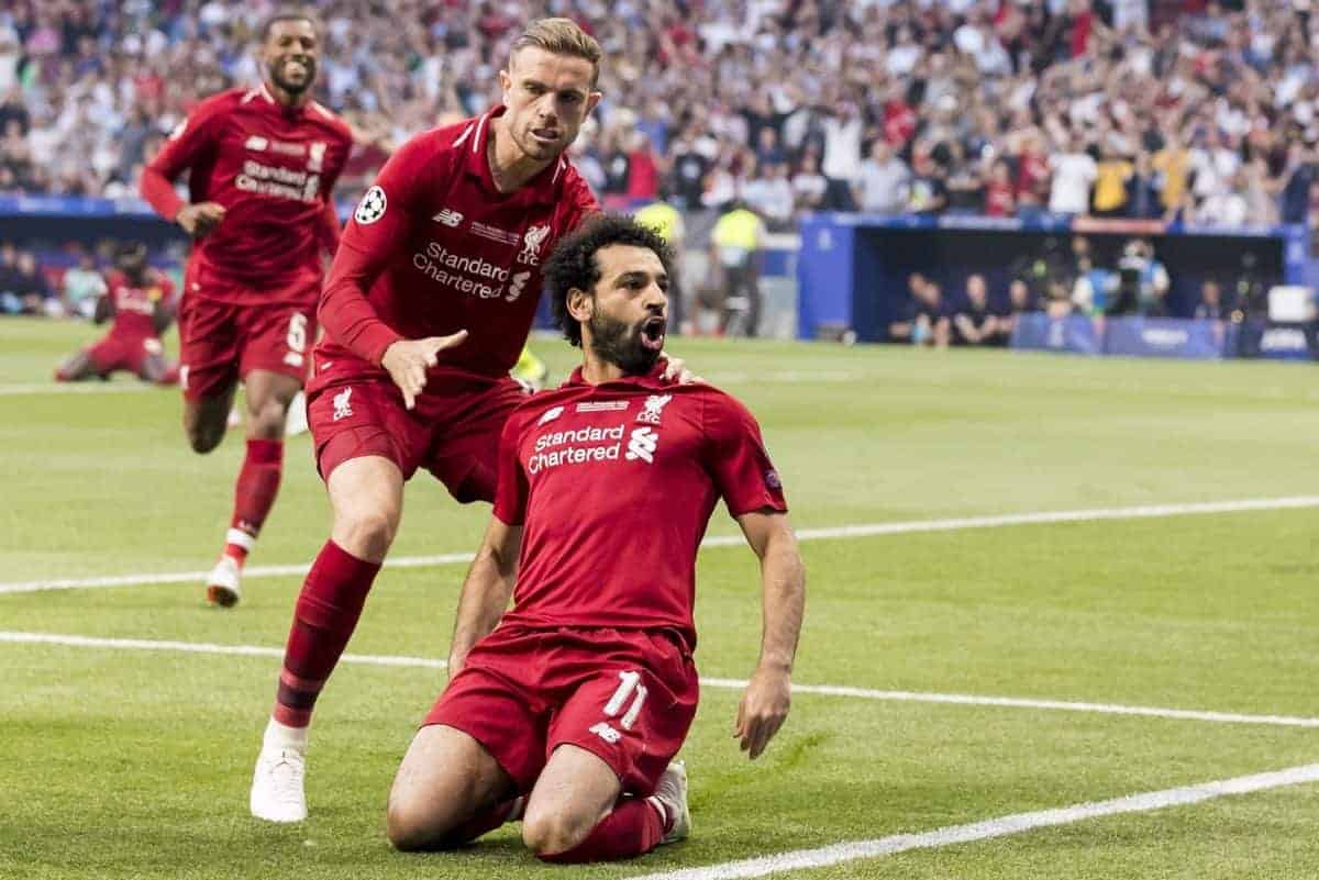 MADRID, SPAIN - SATURDAY, JUNE 1, 2019: Liverpool's Mohamed Salah celebrates scoring his sides first goal from the penalty spot to make the score 0-1 during the UEFA Champions League Final match between Tottenham Hotspur FC and Liverpool FC at the Estadio Metropolitano. (Pic by Paul Greenwood/Propaganda) Jordan Henderson