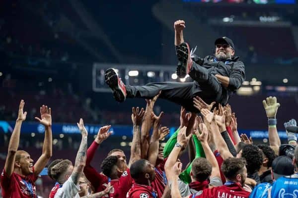 MADRID, SPAIN - SATURDAY, JUNE 1, 2019: Liverpool's players throw Liverpool Manager Jurgen Klopp in the air as they celebrate a 2-0 victory in the UEFA Champions League Final match between Tottenham Hotspur FC and Liverpool FC at the Estadio Metropolitano. (Pic by Paul Greenwood/Propaganda)