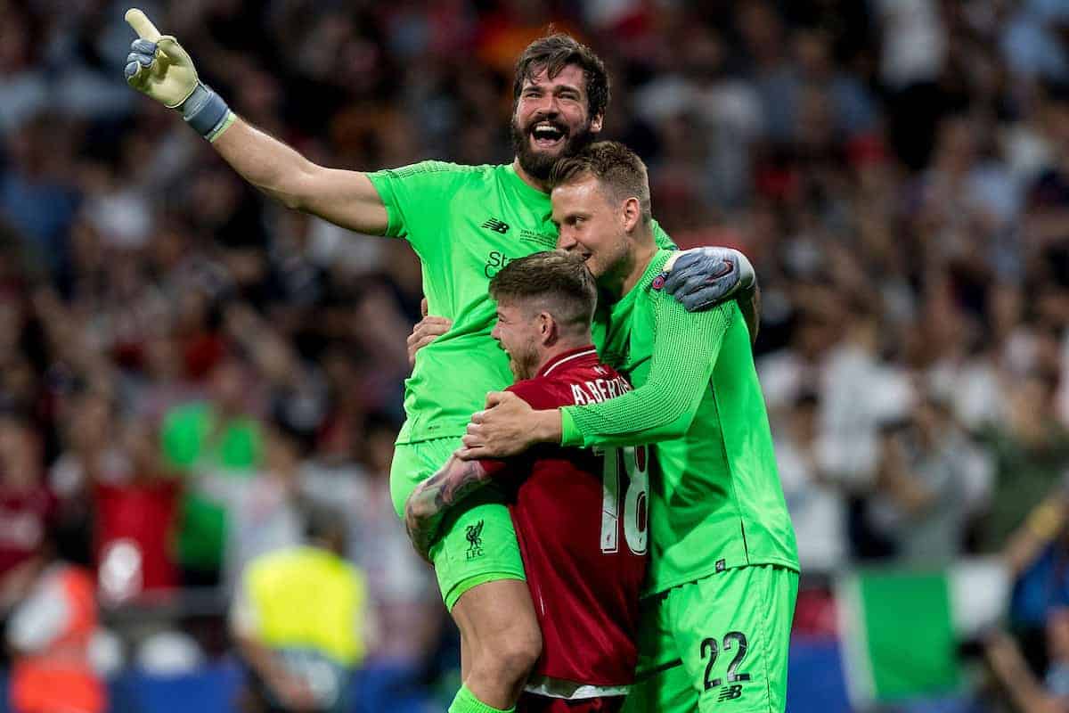 MADRID, SPAIN - SATURDAY, JUNE 1, 2019: Liverpool's goalkeeper Alisson Becker is embraced by Alberto Moreno and Simon Mignolet after a 2-0 victory in the UEFA Champions League Final match between Tottenham Hotspur FC and Liverpool FC at the Estadio Metropolitano. (Pic by Paul Greenwood/Propaganda)