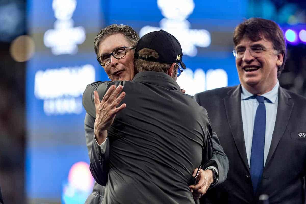 MADRID, SPAIN - SATURDAY, JUNE 1, 2019: Liverpool's manager Jürgen Klopp is embraced by owner John W Henry following a 2-0 victory in the UEFA Champions League Final match between Tottenham Hotspur FC and Liverpool FC at the Estadio Metropolitano. (Pic by Paul Greenwood/Propaganda)