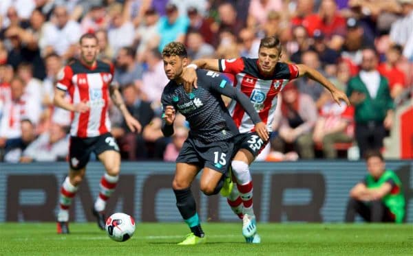 LIVERPOOL, ENGLAND - Saturday, August 17, 2019: Liverpool's Alex Oxlade-Chamberlain (L) and Southampton's Jan Bednarek (R) during the FA Premier League match between Southampton FC and Liverpool FC at St. Mary's Stadium. (Pic by David Rawcliffe/Propaganda)