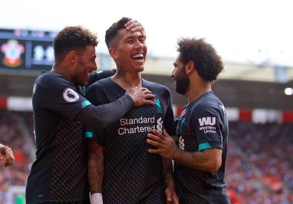 LIVERPOOL, ENGLAND - Saturday, August 17, 2019: Liverpool's Roberto Firmino (C) celebrates scoring the second goal with team-mates Alex Oxlade-Chamberlain (L) and Mohamed Salah (R) during the FA Premier League match between Southampton FC and Liverpool FC at St. Mary's Stadium. (Pic by David Rawcliffe/Propaganda)