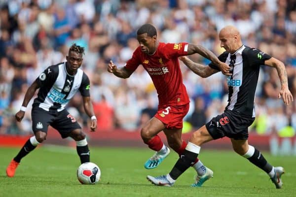 LIVERPOOL, ENGLAND - Saturday, September 14, 2019: Liverpool's Georginio Wijnaldum (C) and Newcastle United's Jonjo Shelvey during the FA Premier League match between Liverpool FC and Newcastle United FC at Anfield. (Pic by David Rawcliffe/Propaganda)